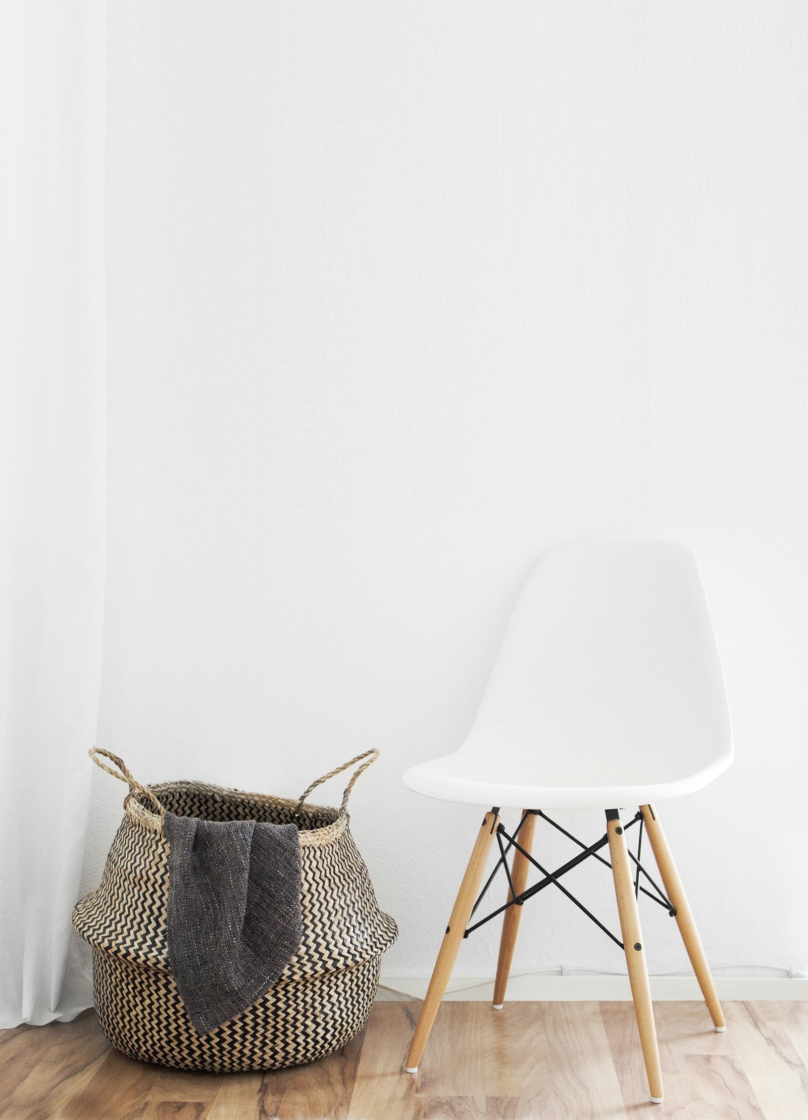 Folded denim and casual garments arranged on a table